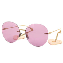 Cargar imagen en el visor de la galería, Round-frame sunglasses with heart charms
